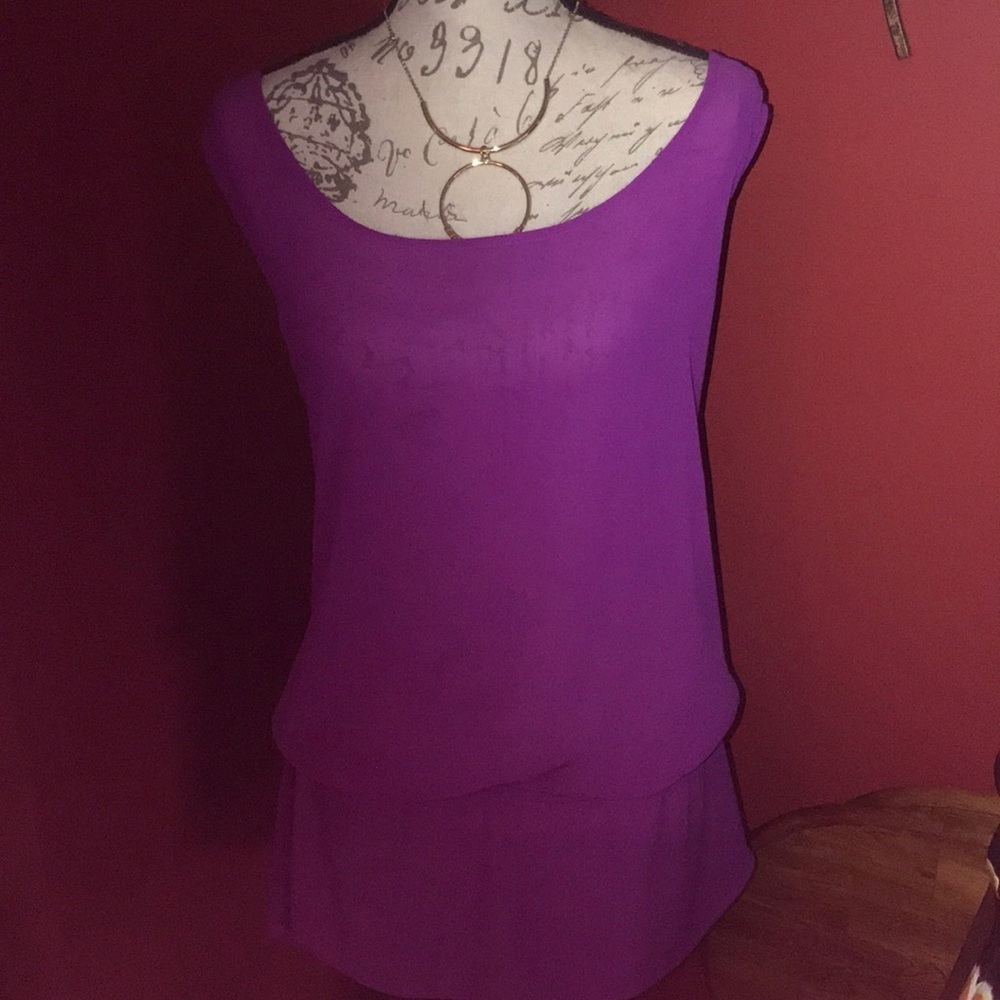 Sleeveless orchid colored blouse